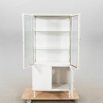 A mid 1900s metal medicine cabinet.