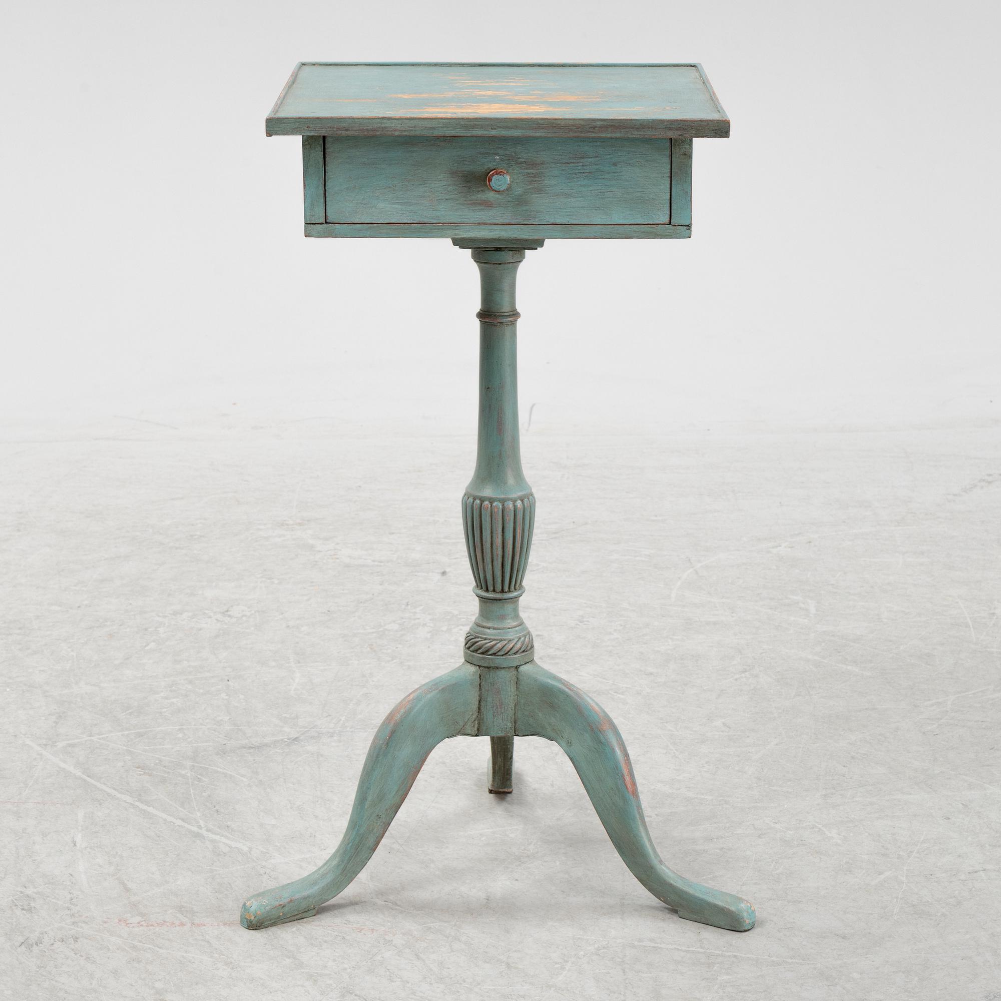A painted late Gustavian style table with a drawer.
