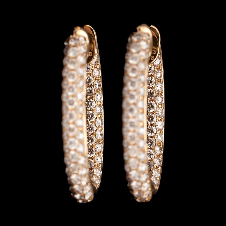 A pair of brilliant cut diamond earrings, tot. 3.33 cts.