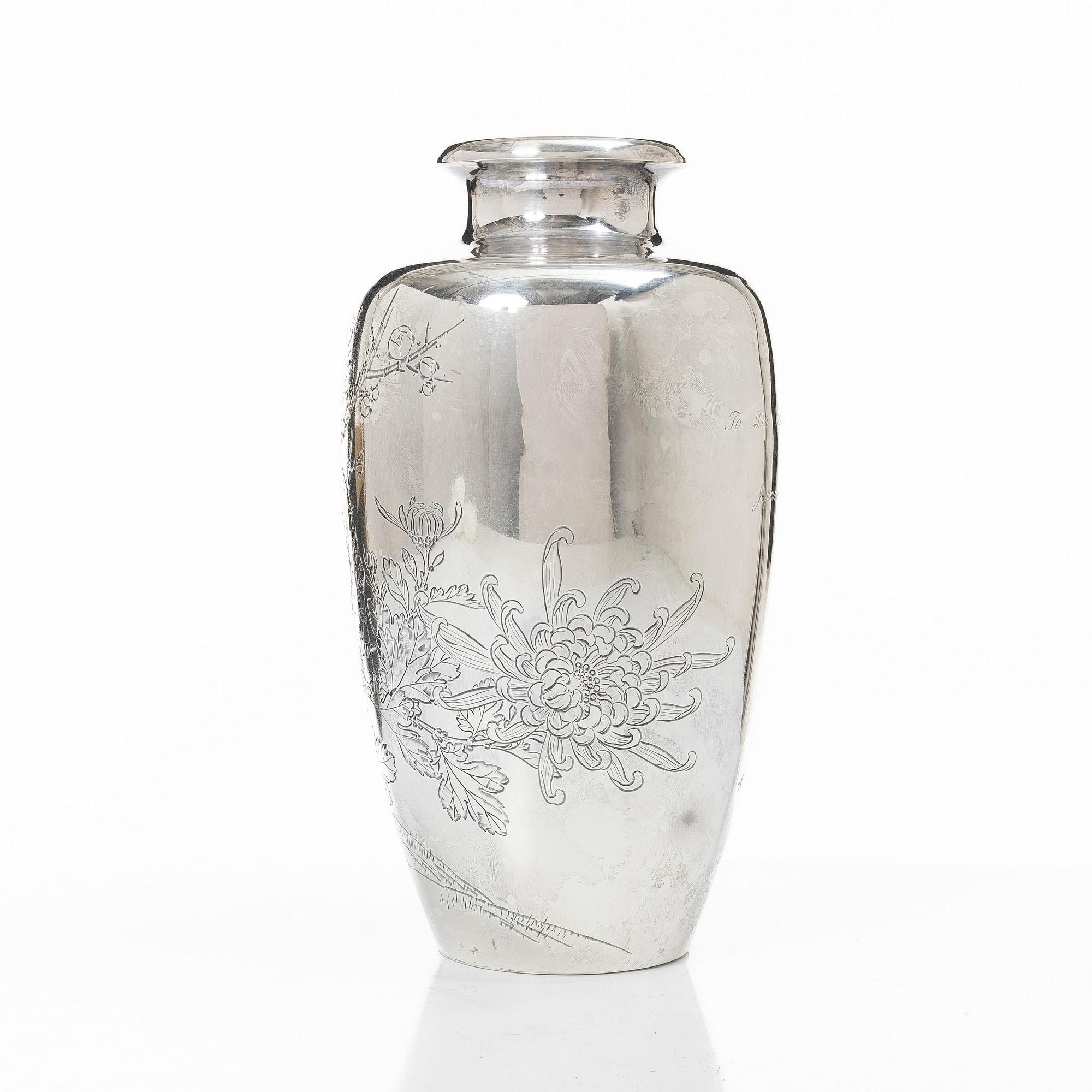 A silver vase, Japan, Meiji (1862-1912) or Tiasho (1912-1926).