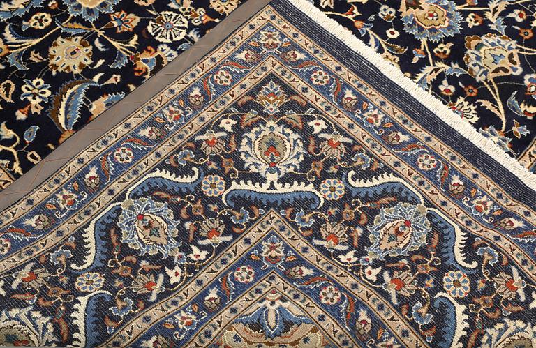 A Keshan carpet, approx. 400 x 295 cm.
