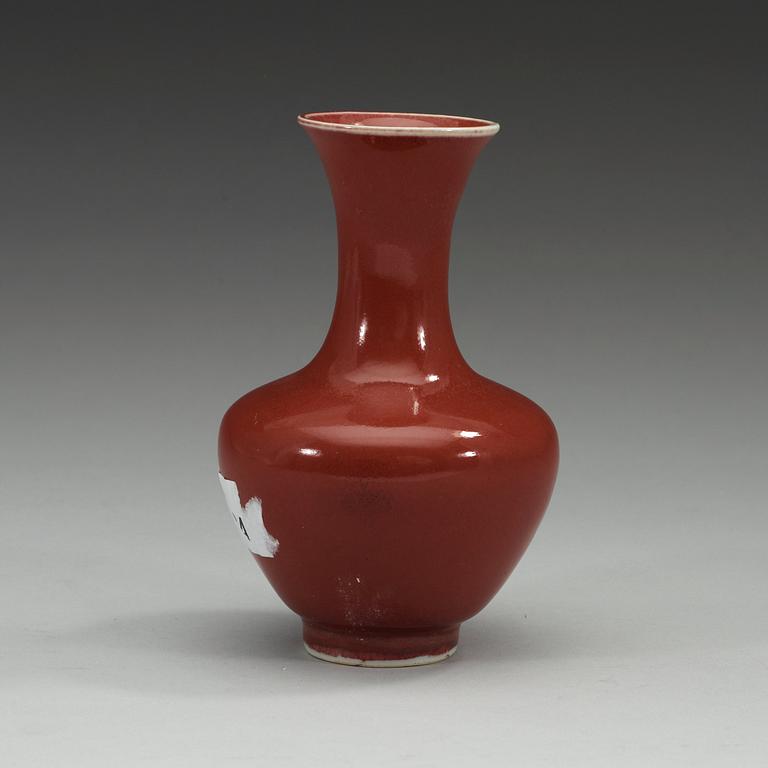 A sang de boef glazed vase, Qing dynasty, 18th Century.