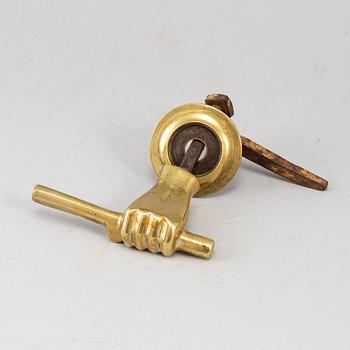 A 19th century brass door handle.