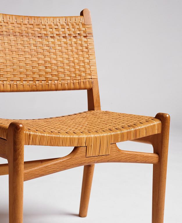 Hans J. Wegner, a set of 10 oak and rattan 'CH31' chairs, Carl Hansen & Son, Denmark 1950s.