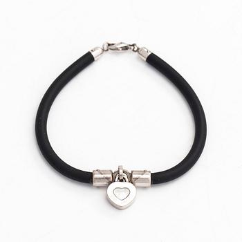 Chopard, armband, "Happy Diamonds", 18K vitguld, gummi och en diamant 0.05 ct.