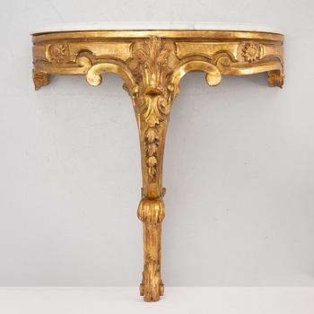 A Rococo style onsole table, circa 1900.