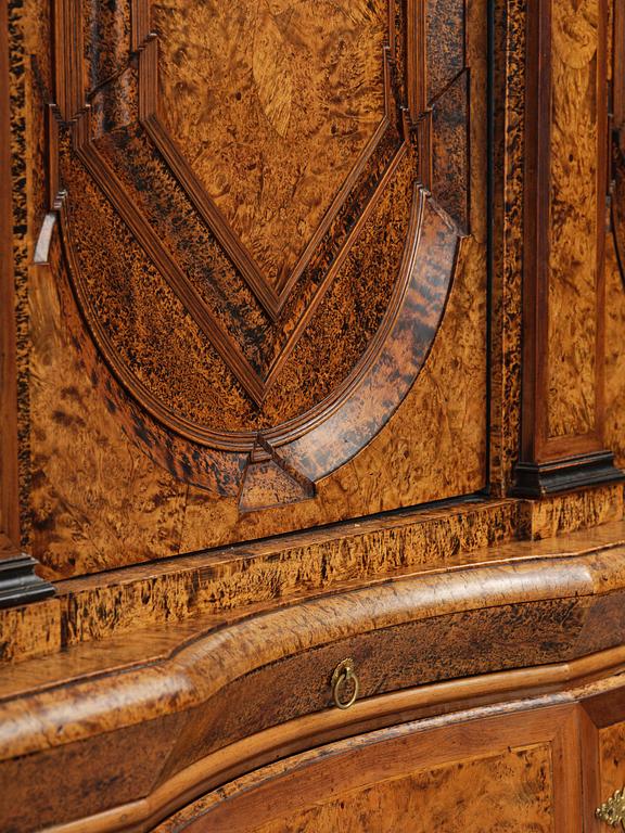 A Swedish late baroque burr-alder cabinet, first part 18th century.