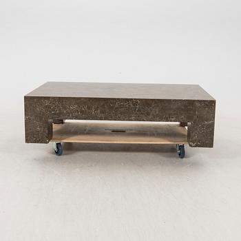 A late 20th century travertine coffee table.