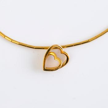 A Cartier 18K gold necklace with heart pendant 1999 and 2001. Certificat and original box.