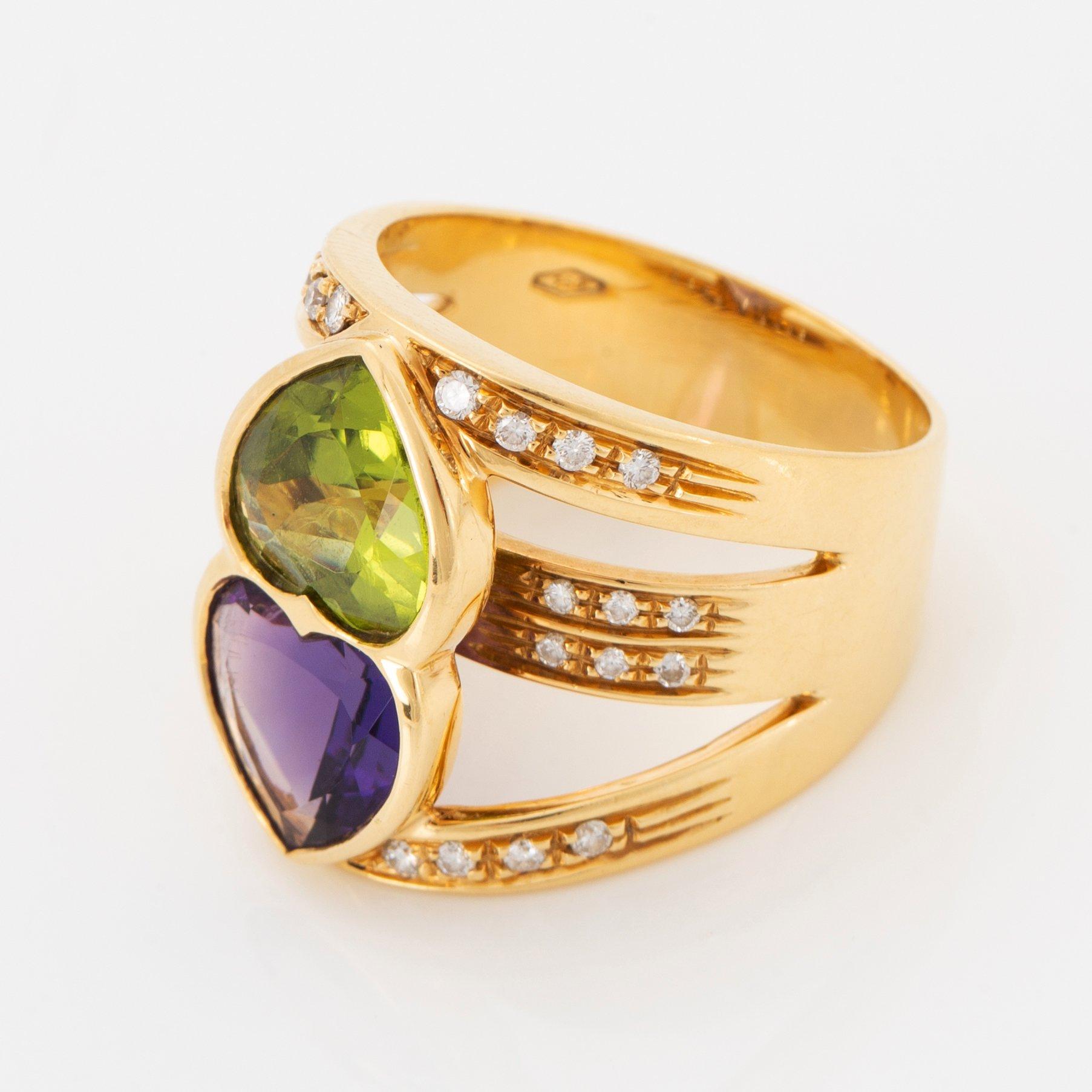 Ring 18K guld med hjärtformad och fasettslipad ametist och peridot.
