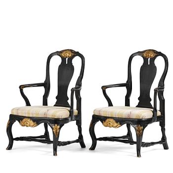 47. A pair of Swedish rococo open-back armchairs, Stockholm, late part 18th century.