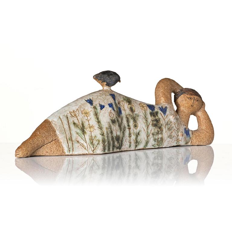 Lisa Larson, a unique chamotte stoneware sculpture of a reclining female figure with a bird, Gustavsberg Studio, probably 1950s-60s.