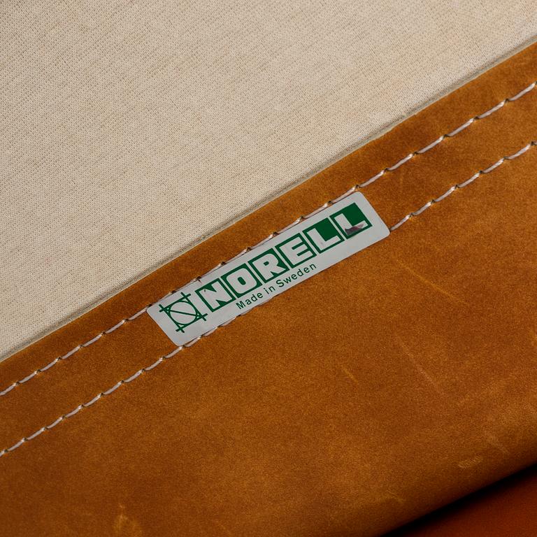 A 1960/70's 'Inca' easy chair and a foot stool by Arne Norell.