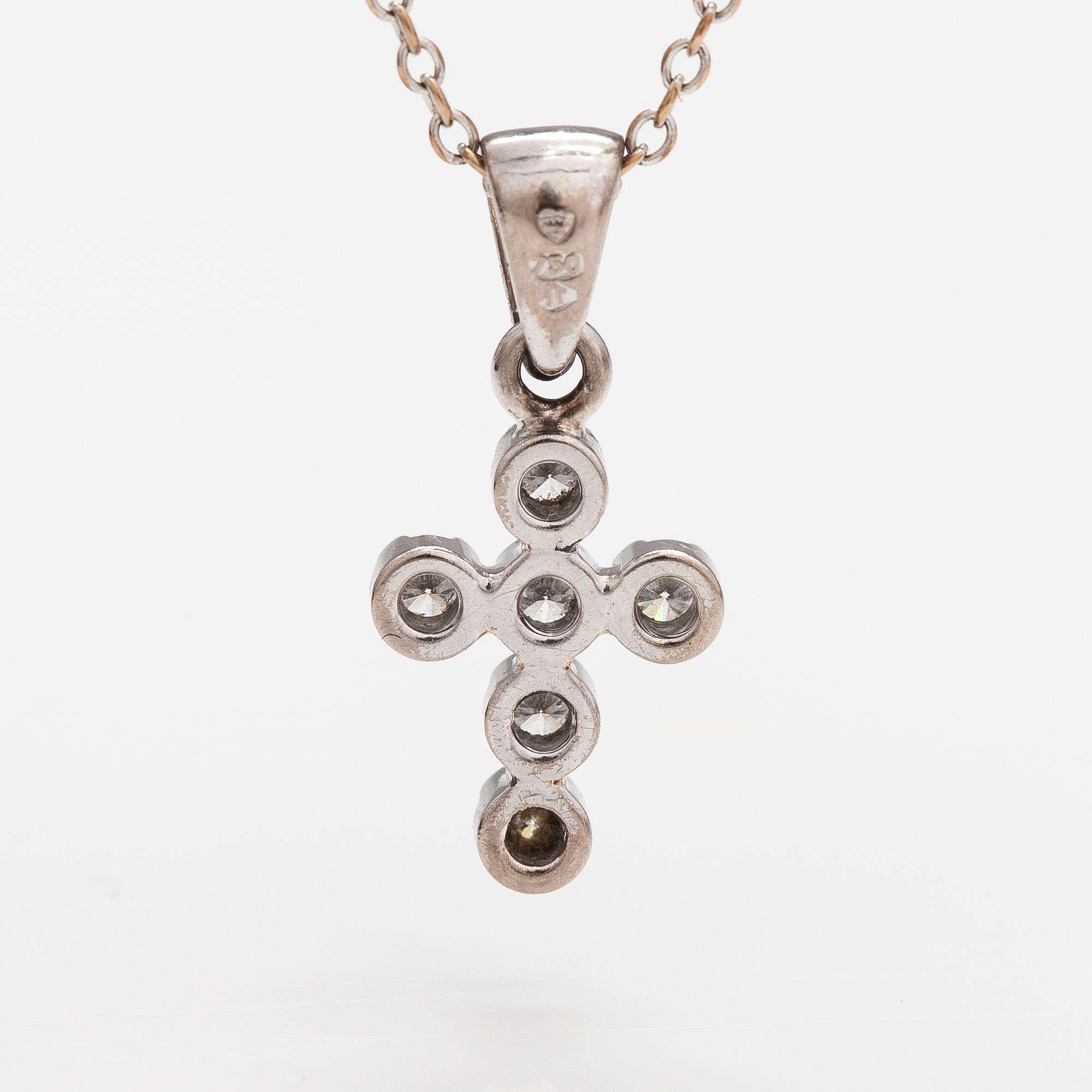 RISTI/RIIPUS, 18K valkokultaa, timantteja n. 0.18 ct yht. A Tillander, Helsinki.