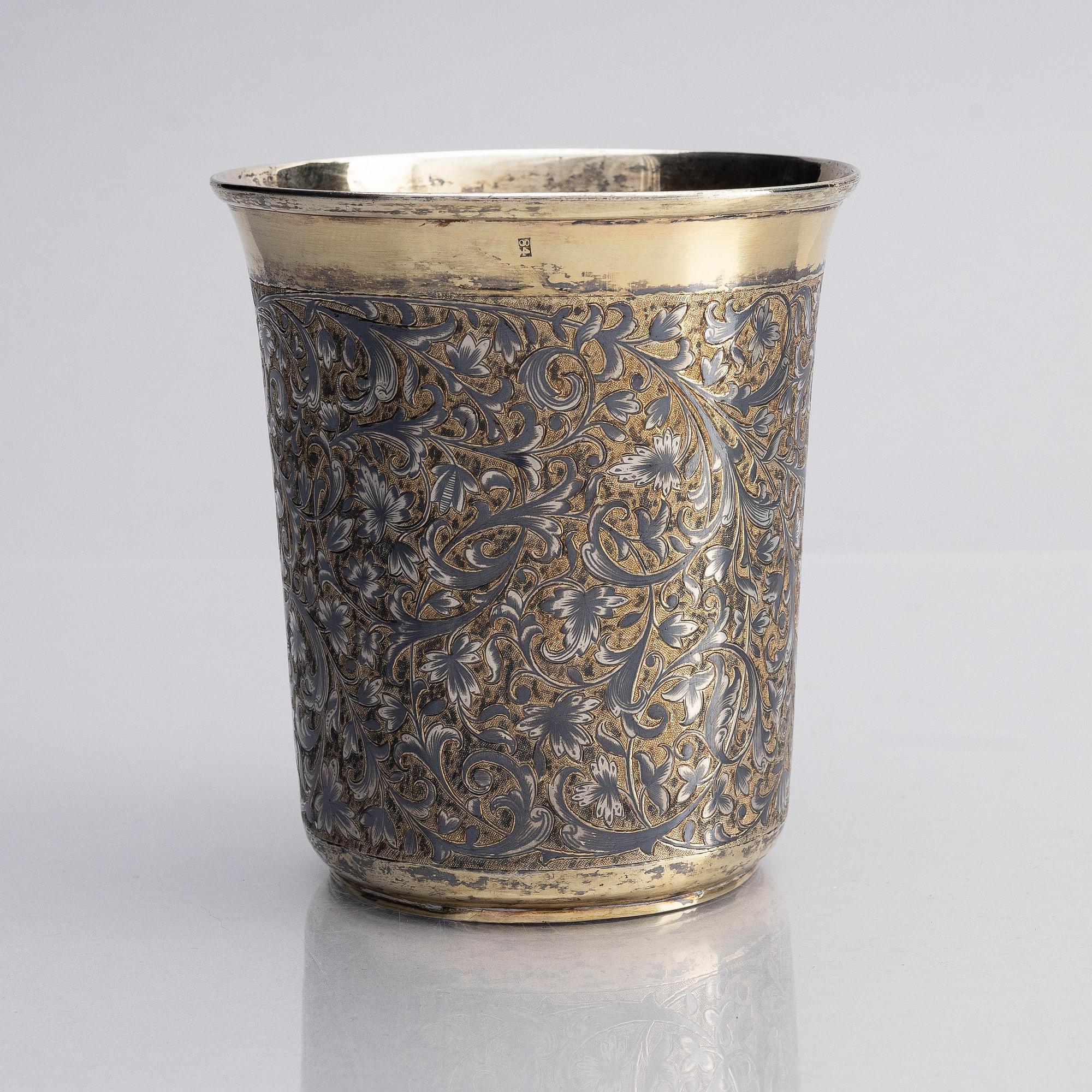 A Russian silver-gilt beaker with niello, unidentified maker A.K., assay master Michael Chumazov, Moscow 1846.