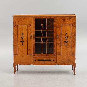 A birch wood veneered cabinet, 1920s.