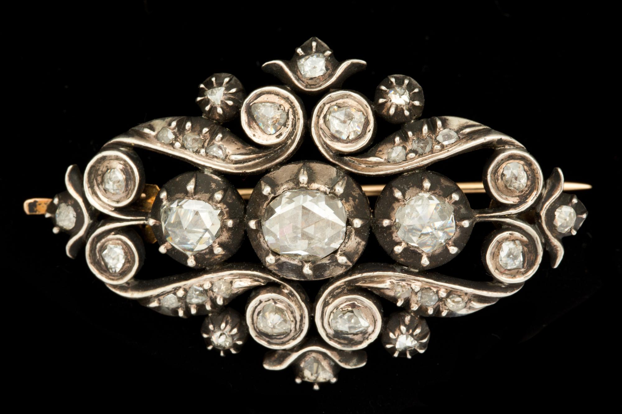 A late Victorian rose-cut diamond brooch.