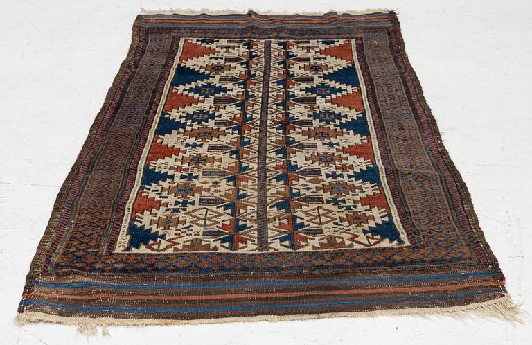 An antique Baluch rug, East Persia, c. 147 x 45 cm.