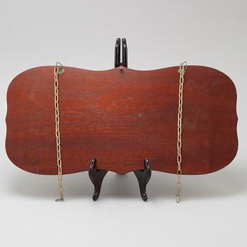 A wall clock and a barometer from Schatz.