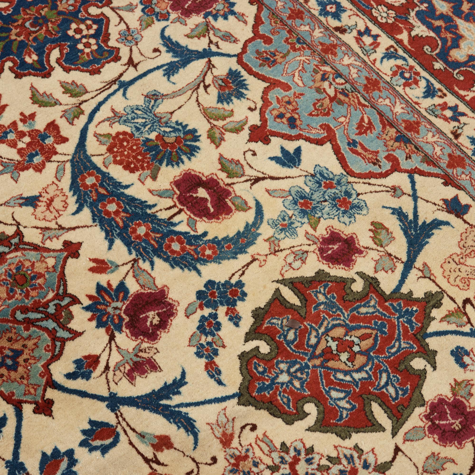 A old Esfahan carpet, around 299 x 210 cm.