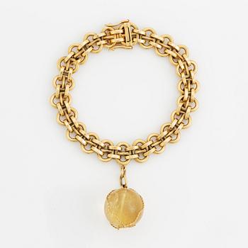 Claës E. Giertta, 18K gold bracelet with citrine charm.