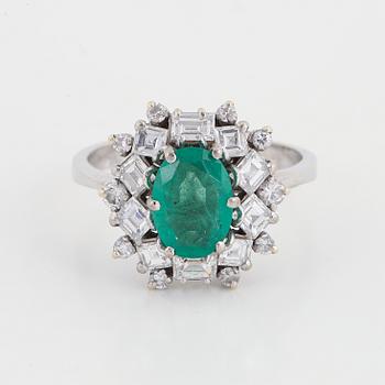 Emerald and diamond ring.