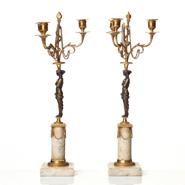 A pair of late Gustavian circa 1800 three-light candelabra.