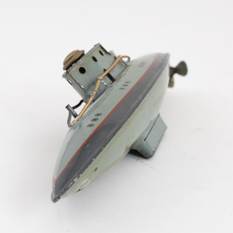 A toy submarine in painted sheet metal, 1920's.