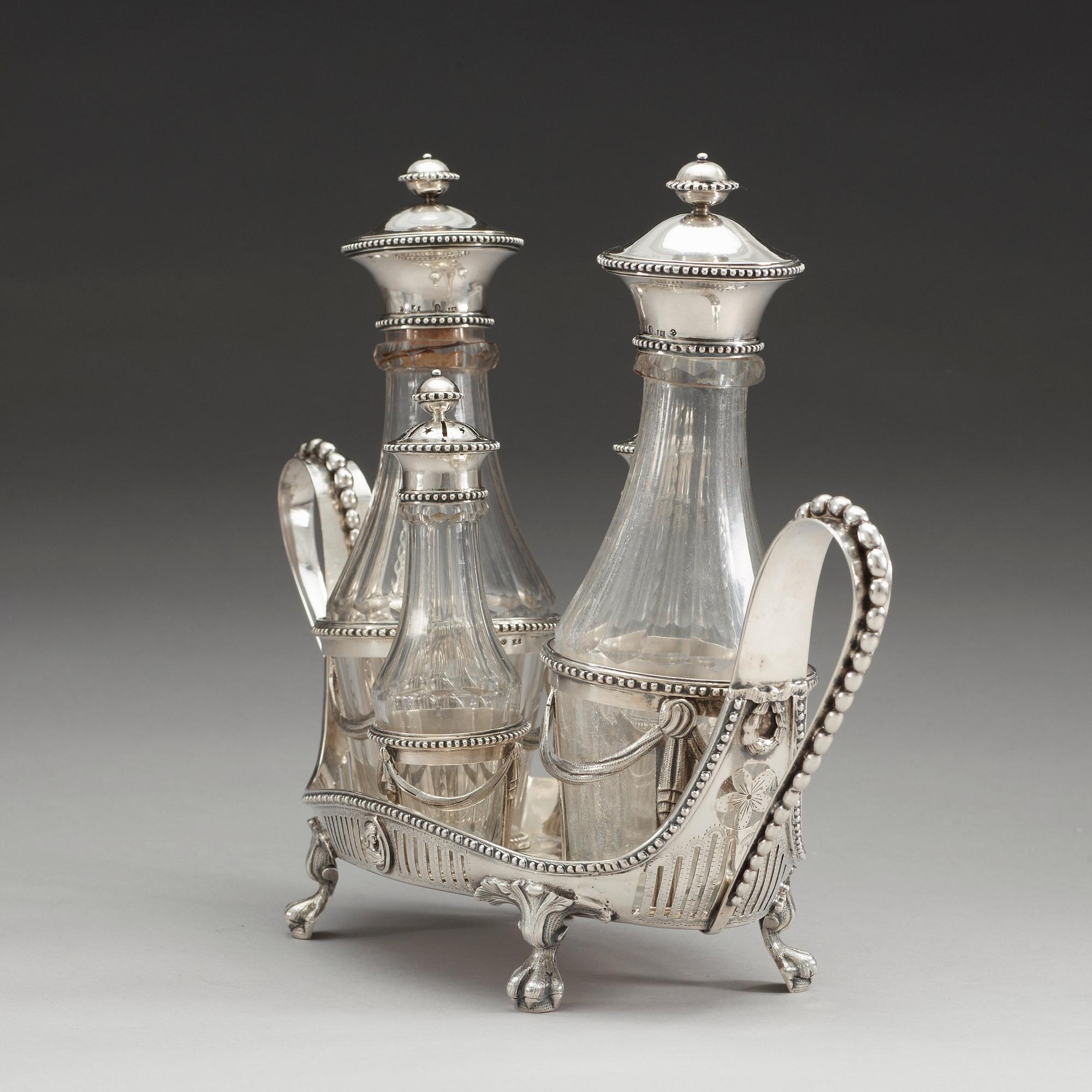 BORDSSURTOUT för fyra flaskor, av Petter Eneroth, Stockholm 1787. Gustaviansk.