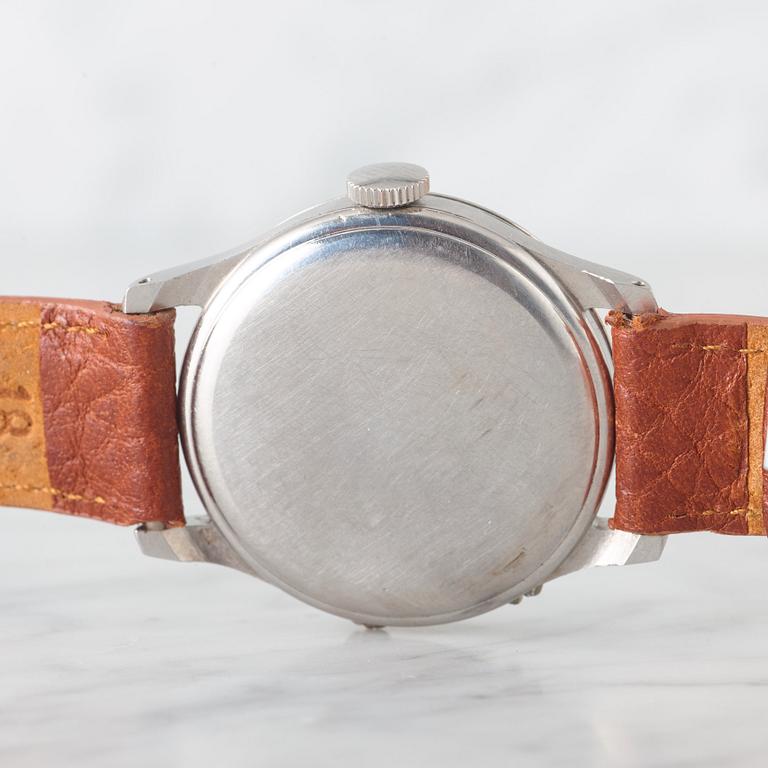 E. GÜBELIN, Lucerne, "Triple Date", wristwatch, 34 mm.