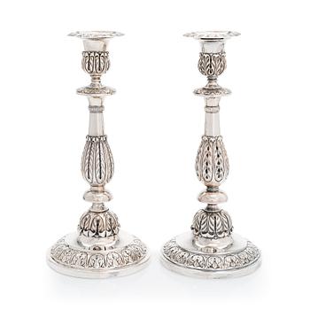 A pair of Russian silver candlesticks, maker's mark of Carl Johan Heyne, Saint Petersburg 1825.