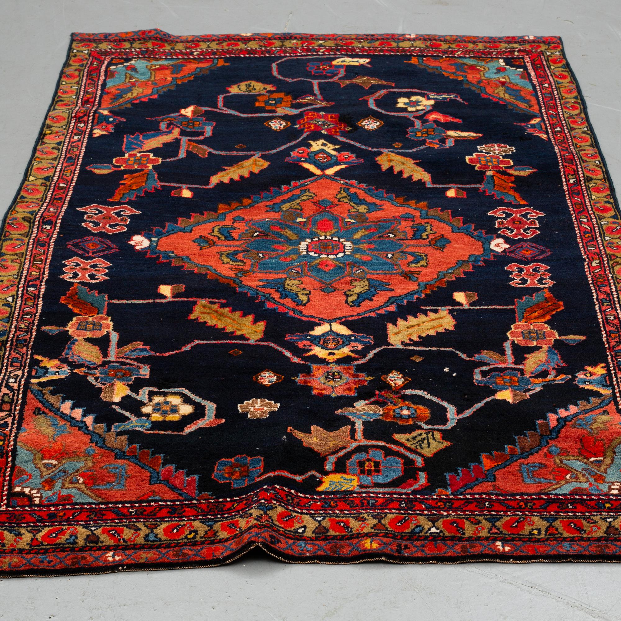 A rug, semi-antique Kurdish, ca 194 x 112 cm.