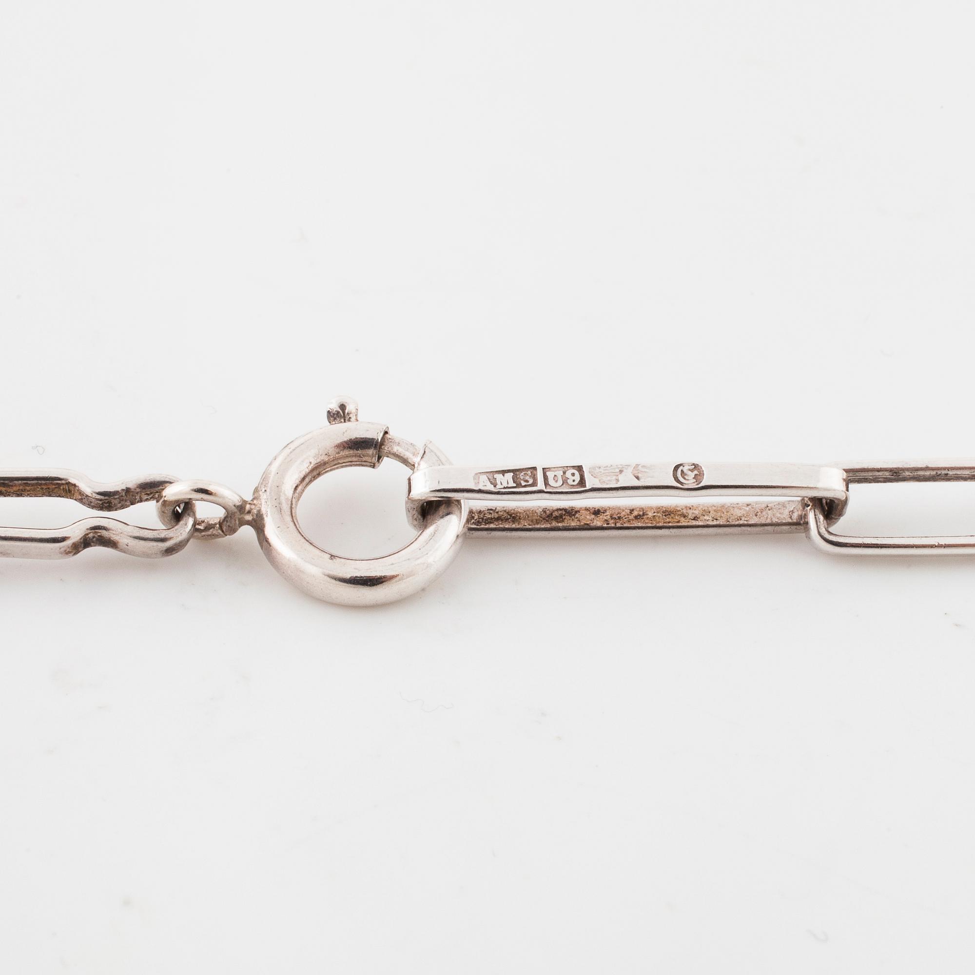 GERT THYSELL, Gussi, Malmö, 1967, a faceted smoky quartz pendant.