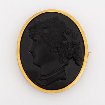 Brooch, with carved black stone cameo.