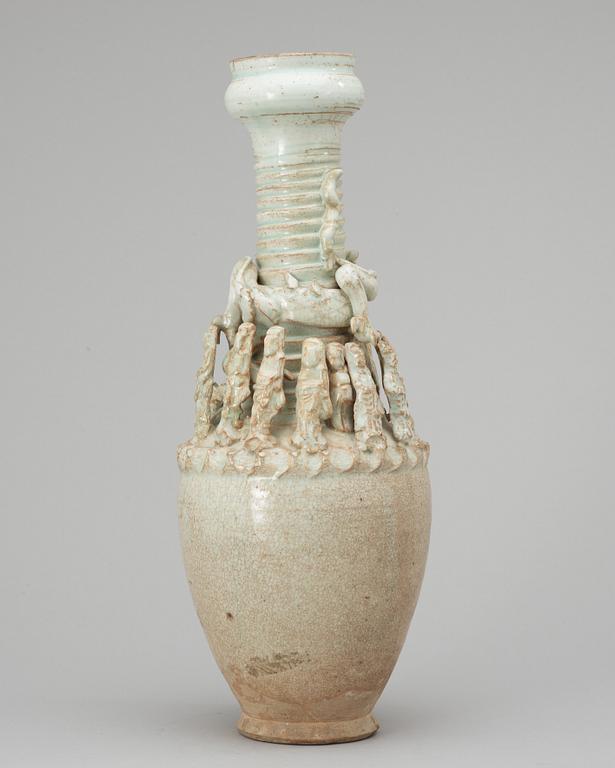 A pale green glazed vase, Yuan dynasty.