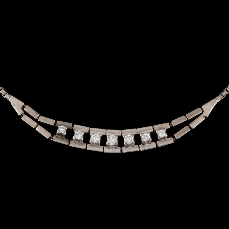 A diamond, circa 0.40 ct in total, necklace.