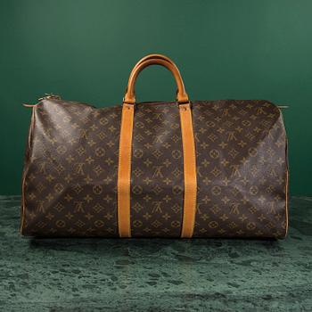 A monogram canvas weekendbag "Keepall 55" by Louis Vuitton.