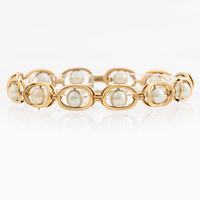 Bracelet 18K gold with cultured pearls.