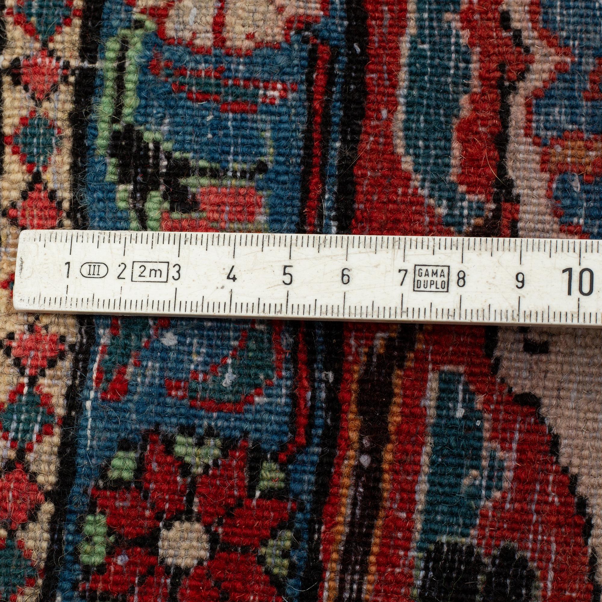 A semi-antique Veramin 325 x 212 cm.