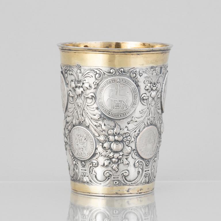 A Prussian 18th century parcel-gilt beaker, makers mark Johann Leopold Käwerstein, Königsberg 1754-1761.