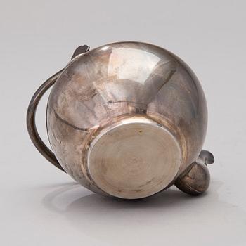 A Korean Silver Tea Pot.