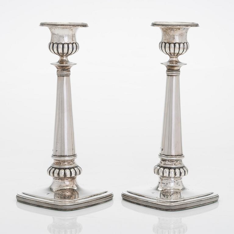 A pair of silver candlesticks, maker's mark of A. Homan, active in Amsterdam, 1817 – 1842.