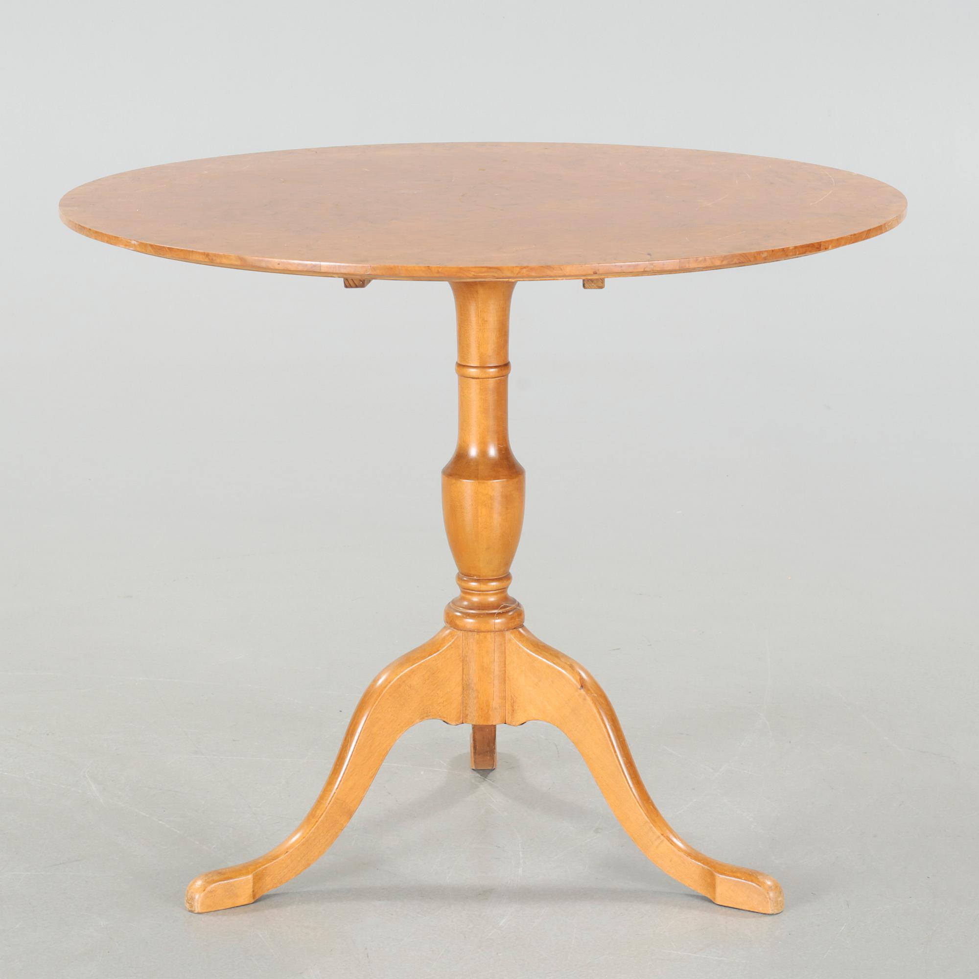 A folding table, made in the first half of the 20th century.