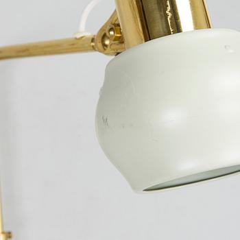 Ilmari Tapiovaara, a 1960s wall light for Metallikolmikko Oy.