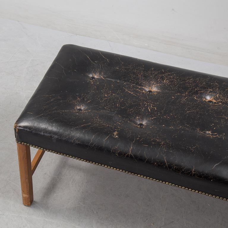 JOSEF FRANK, leather stool/bench, Firma Svenskt Tenn, model 2082.