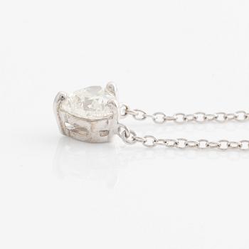 Necklace with heart-shaped diamond, accompanied by GIA report.