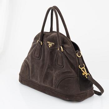 Prada, a chocolate brown suede handbag.