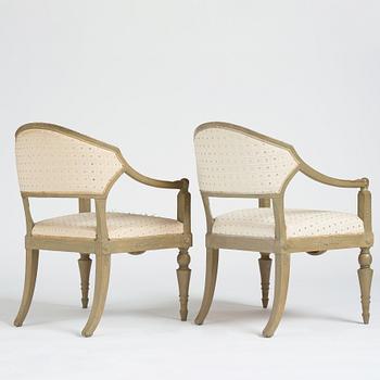 A pair of Late gustavian armchairs.