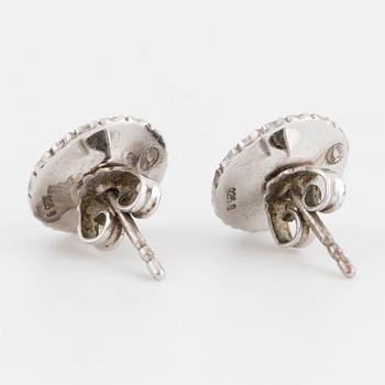 SMYCKESGARNITYR, 4 delar, Georg Jensen, 'Daisy,' sterlingsilver och svart emalj.