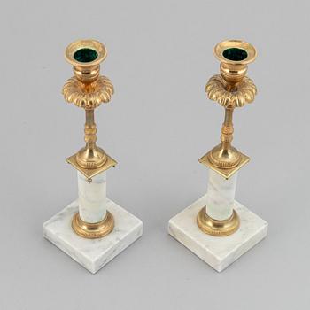 A pair of late gustavian candlesticks, ca 1800.